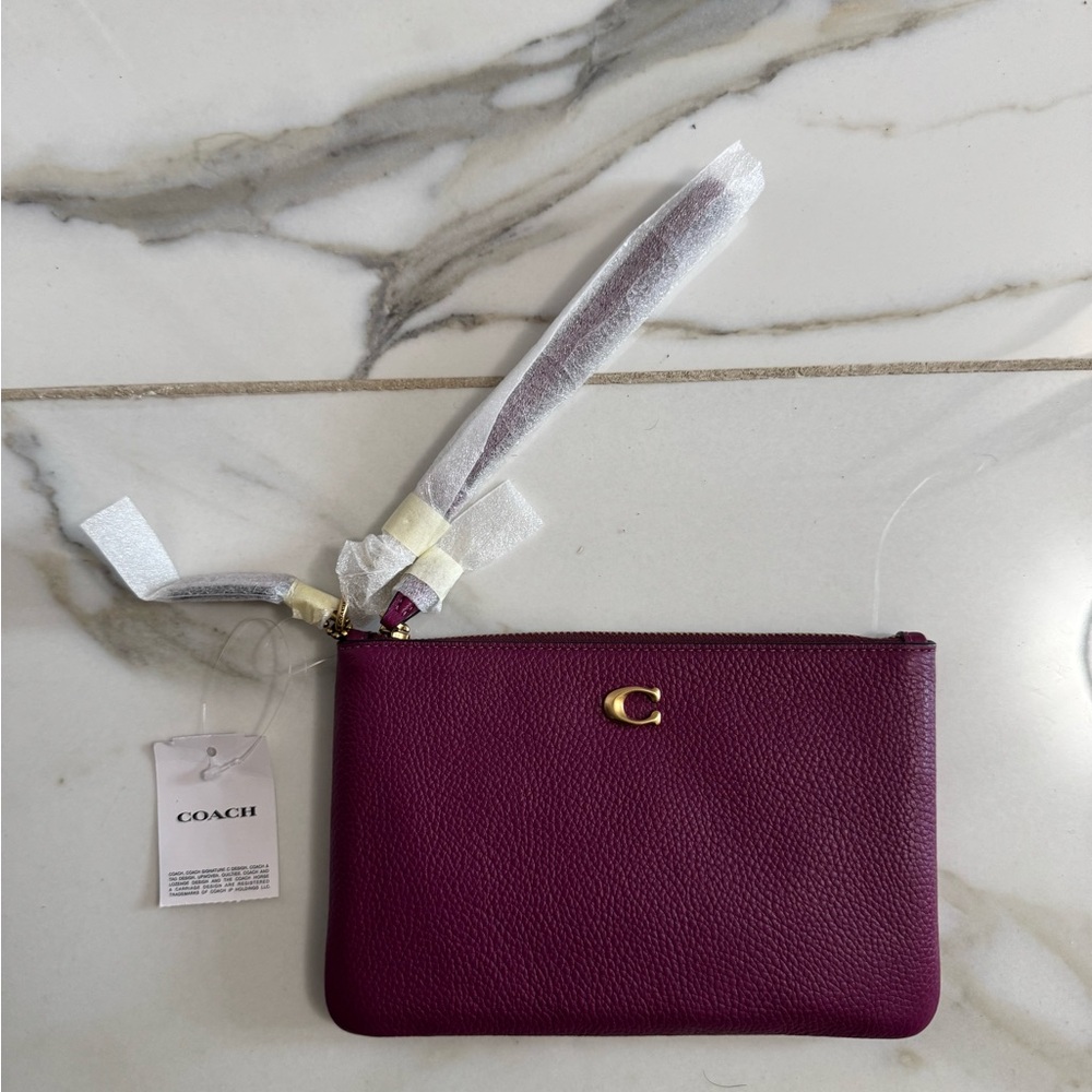NWT Coach Wristlet in Deep Plum